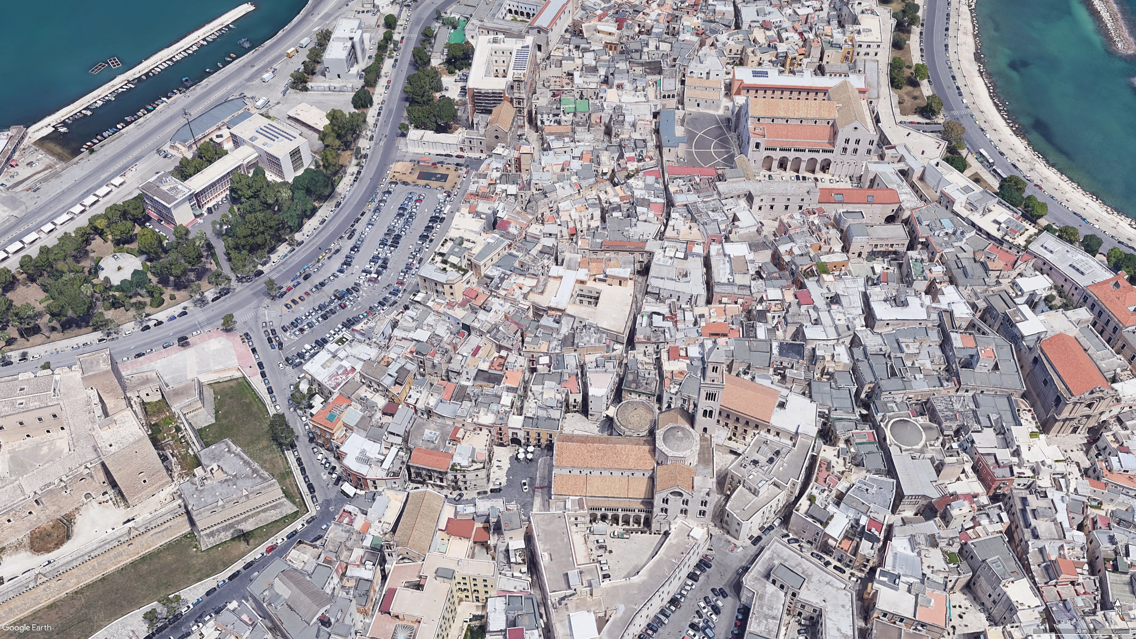 Figure 6. Aerial view of Bari vecchia, with the Norman-Swabian castle in the bottom-left corner, the cathedral at the centre, and St Nicholas in the top-right corner (Google Earth)