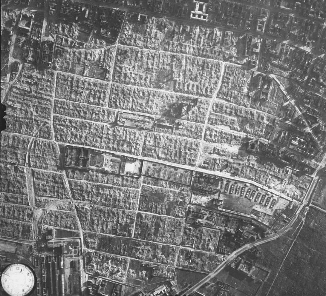 Figure 3. Aerial photograph of northern Warsaw Ghetto area (looking south, north direction located at bottom). In the middle German Concentration Camp in Warsaw (named KL Warschau or KZ Warschau), created in 1943. Public domain, in Wikipedia (accessed on January 20, 2024)